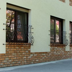 Blacksmithing - a wrought iron grille with a belly